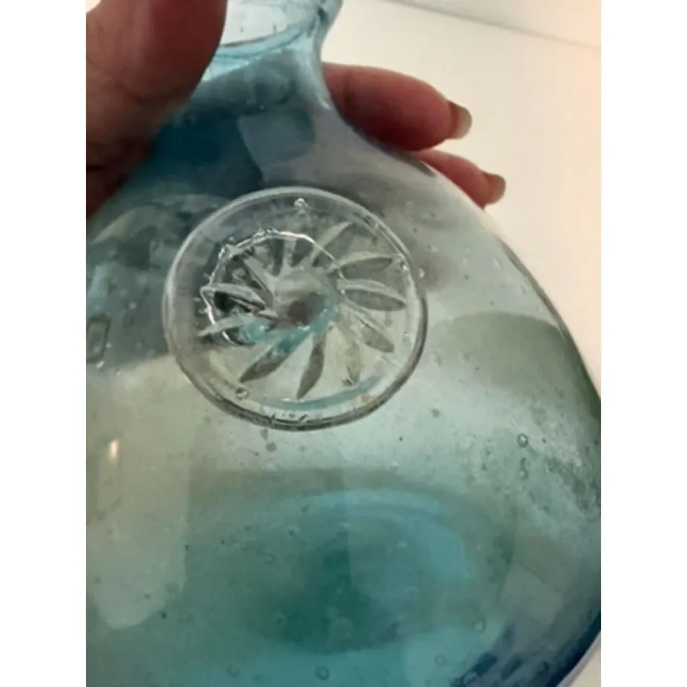 Hand blown aquamarine blue bubble glass vase with applied medallion